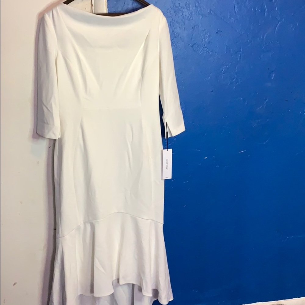 White Calvin Klein with gold zipper